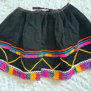 Mexican embroidered circle skirt, pull on, tie back, never worn, fits a small